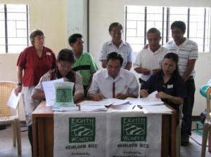Signing the MOA. Seated from left to right, DA Director Rodriguez, MP Governor Dalog and Executive Director of RICE, Inc., Vicky Garcia